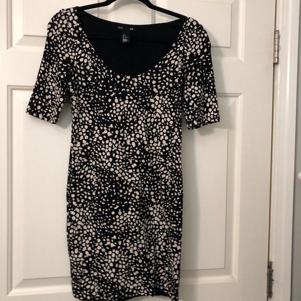 H&M black spotted fitted dress.   Size small EUC
